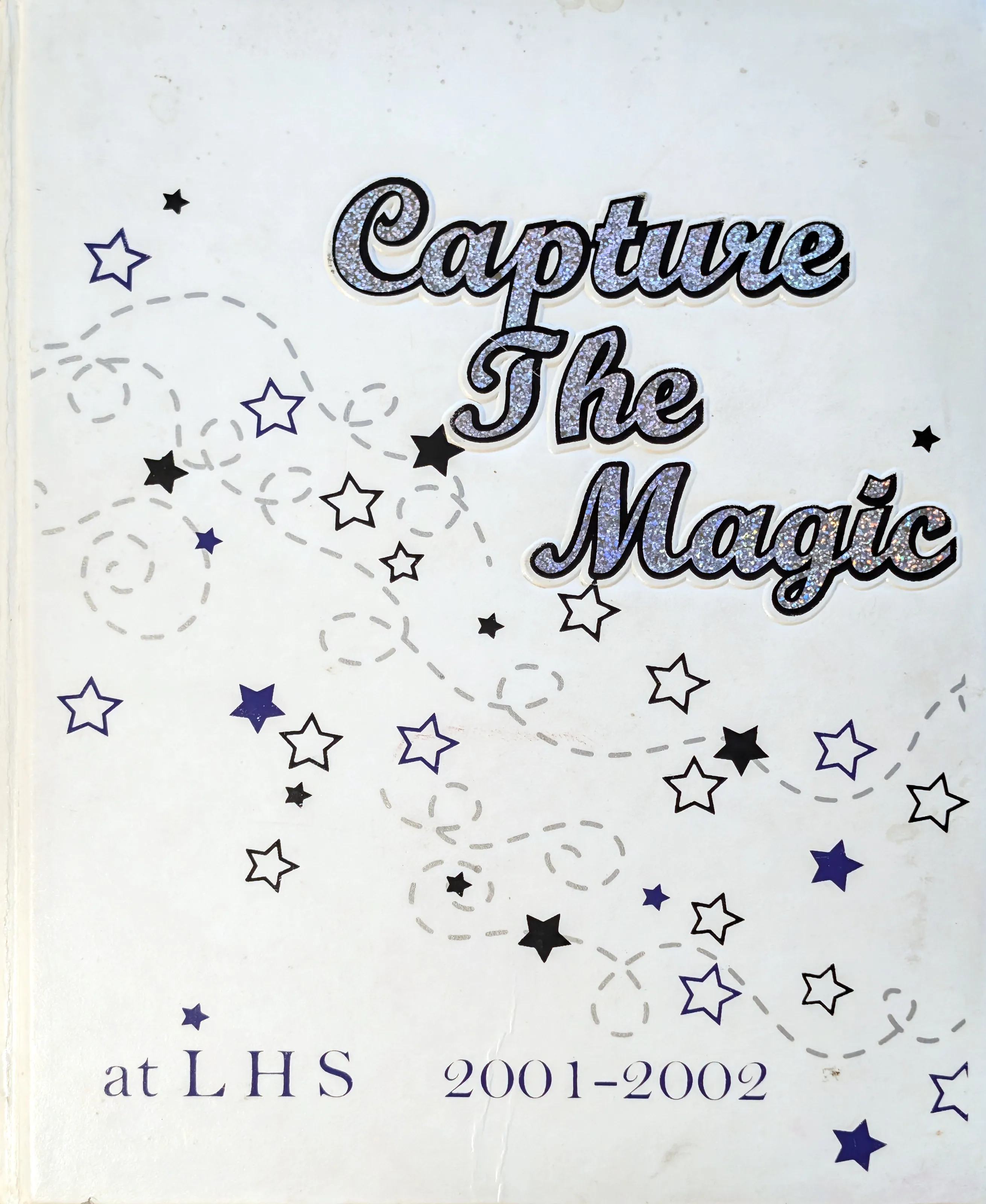 Capture the Magic, the original 2002 yearbook cover